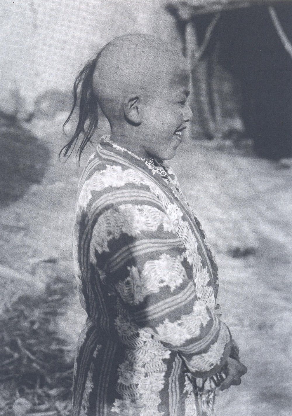 Only the first-born could have a plait on nape. 1932. Samarkand region, Kuduzak kishlak.